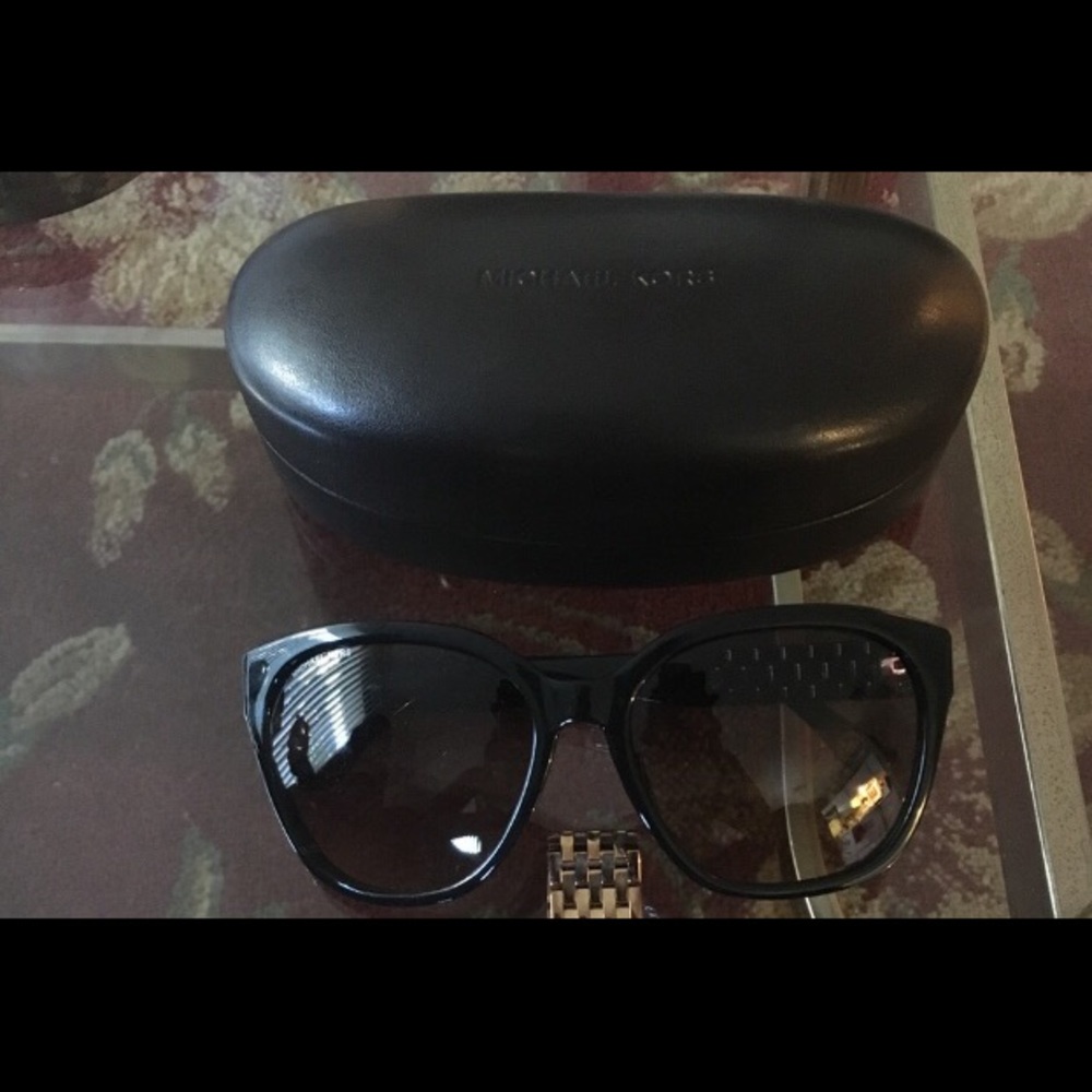 black and gold MK glasses